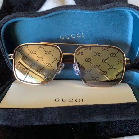 Gucci monogram lenses sunglasses gold metal frame